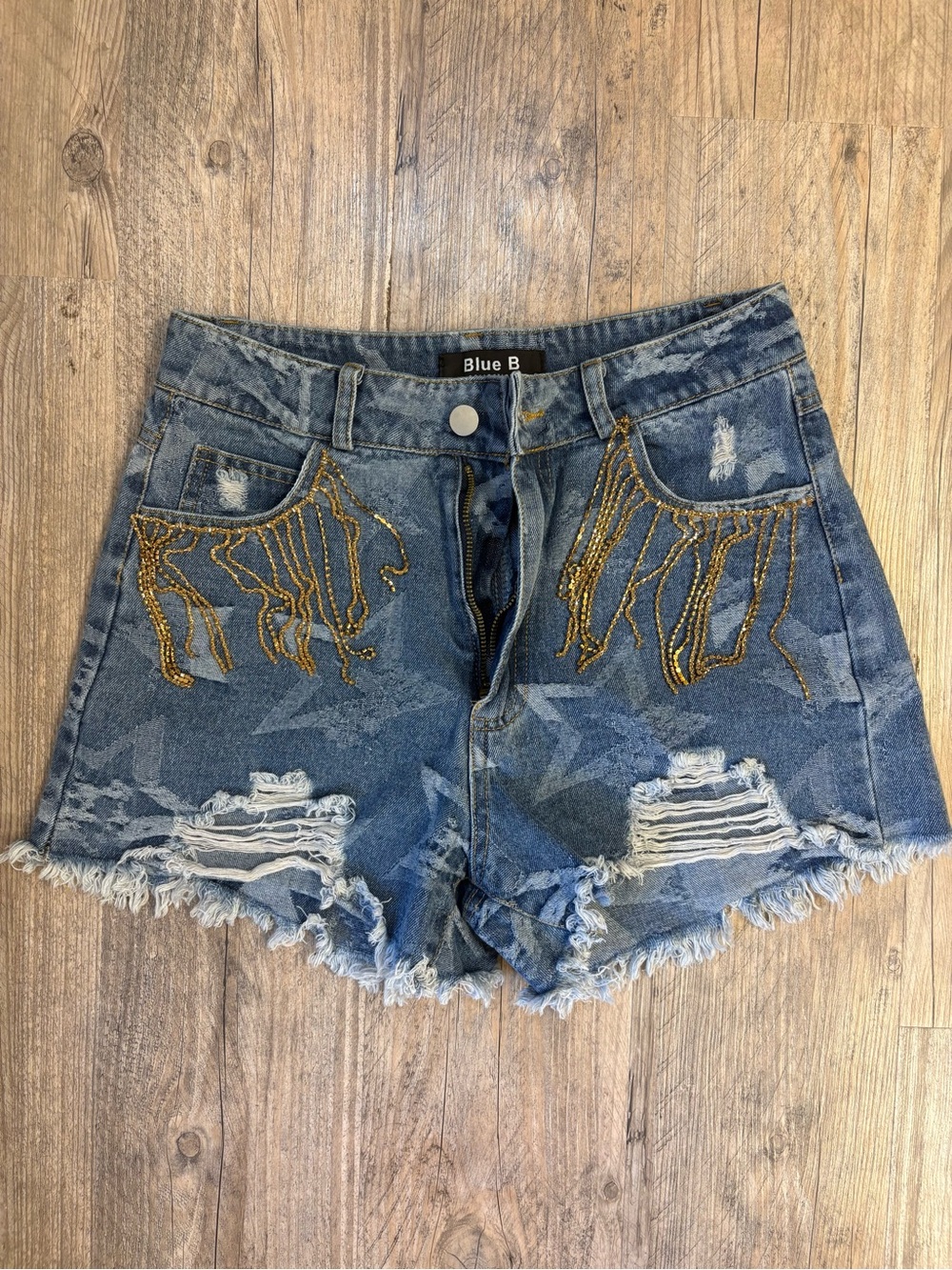 Blue B Women's Distressed Blue Denim Shorts with Gold Bead Fringe